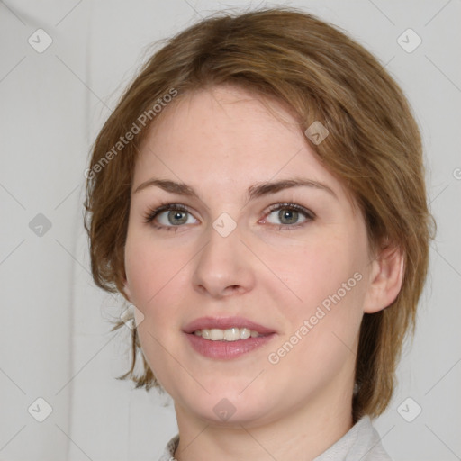 Joyful white young-adult female with medium  brown hair and green eyes