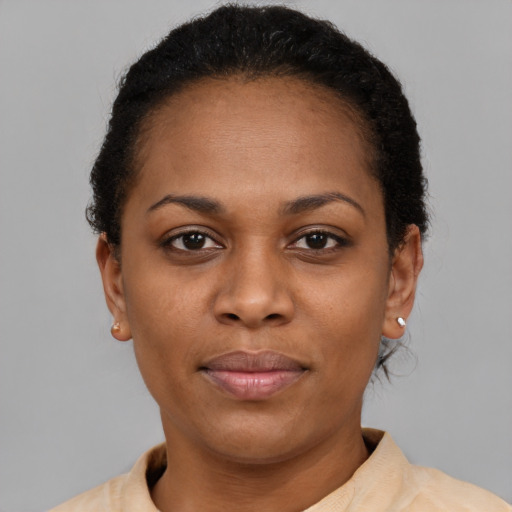 Neutral latino adult female with short  brown hair and brown eyes