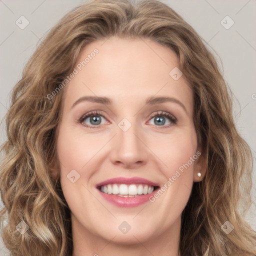 Joyful white young-adult female with long  brown hair and green eyes