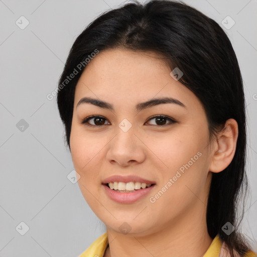 Joyful asian young-adult female with medium  brown hair and brown eyes