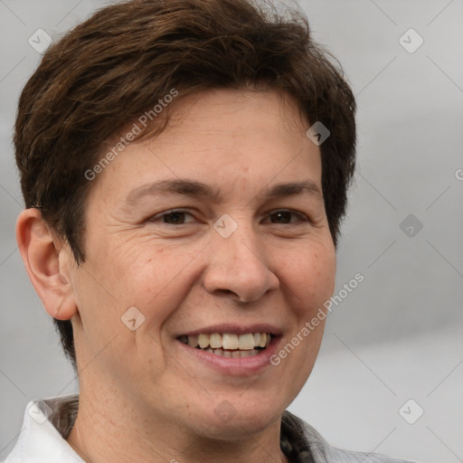 Joyful white adult female with short  brown hair and brown eyes