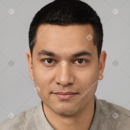 Joyful white young-adult male with short  black hair and brown eyes