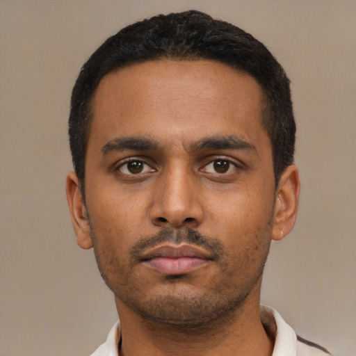 Neutral latino young-adult male with short  black hair and brown eyes