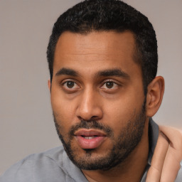 Neutral black young-adult male with short  black hair and brown eyes