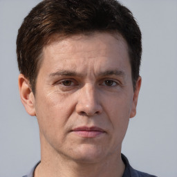 Neutral white adult male with short  brown hair and brown eyes