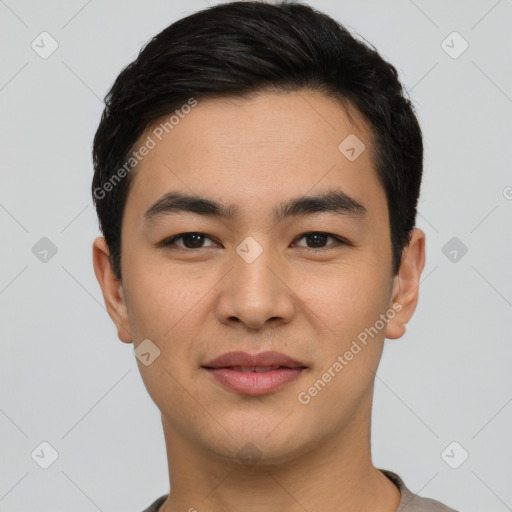 Joyful white young-adult male with short  black hair and brown eyes