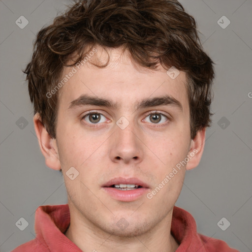 Neutral white young-adult male with short  brown hair and grey eyes