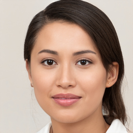 Joyful white young-adult female with medium  brown hair and brown eyes