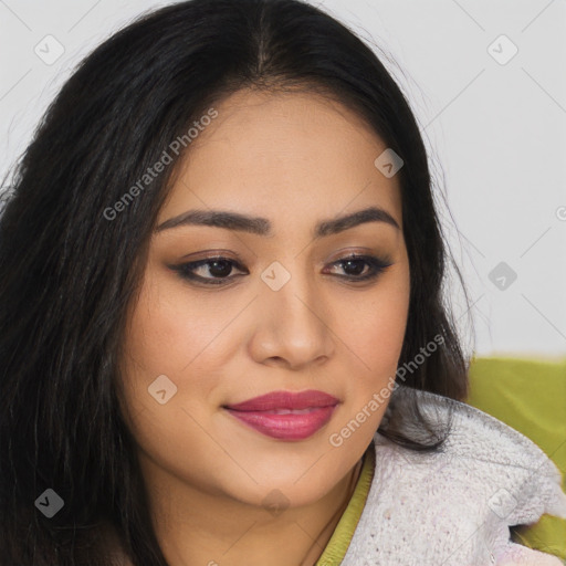 Joyful asian young-adult female with long  brown hair and brown eyes