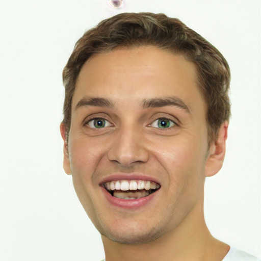 Joyful white young-adult male with short  brown hair and green eyes