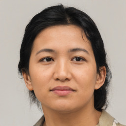 Neutral asian young-adult female with medium  brown hair and brown eyes