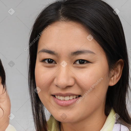 Joyful asian young-adult female with medium  brown hair and brown eyes