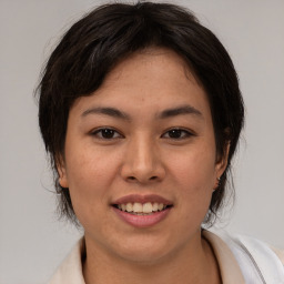 Joyful white young-adult female with medium  brown hair and brown eyes