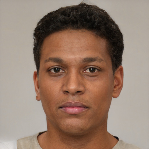 Neutral black young-adult male with short  brown hair and brown eyes