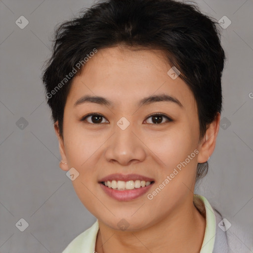 Joyful asian young-adult female with short  brown hair and brown eyes