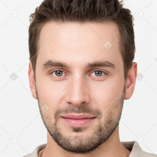 Joyful white young-adult male with short  brown hair and brown eyes