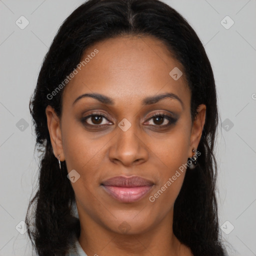 Joyful black young-adult female with long  brown hair and brown eyes