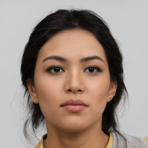 Neutral asian young-adult female with medium  black hair and brown eyes