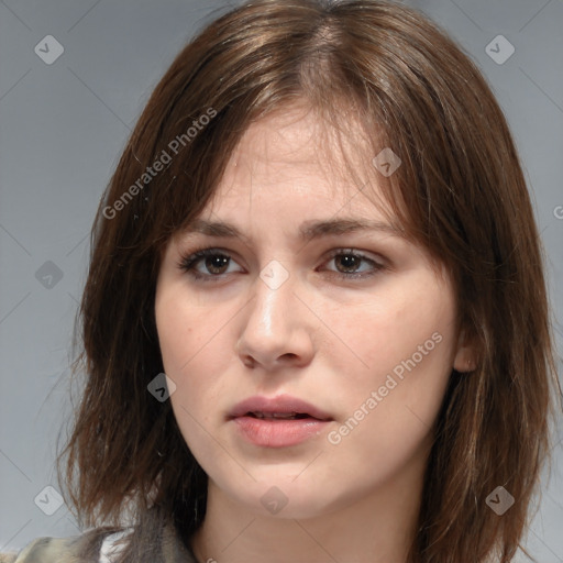 Neutral white young-adult female with medium  brown hair and brown eyes