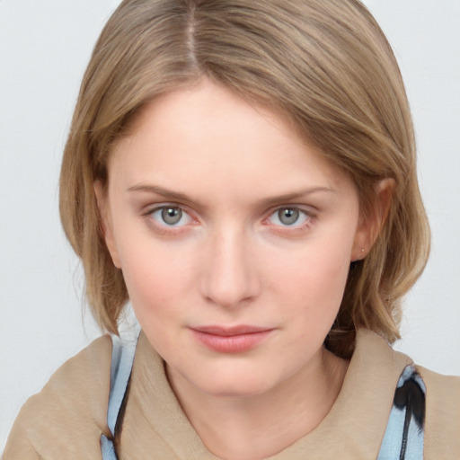 Neutral white young-adult female with medium  brown hair and blue eyes