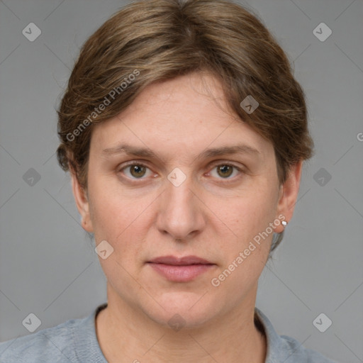 Joyful white adult female with short  brown hair and grey eyes