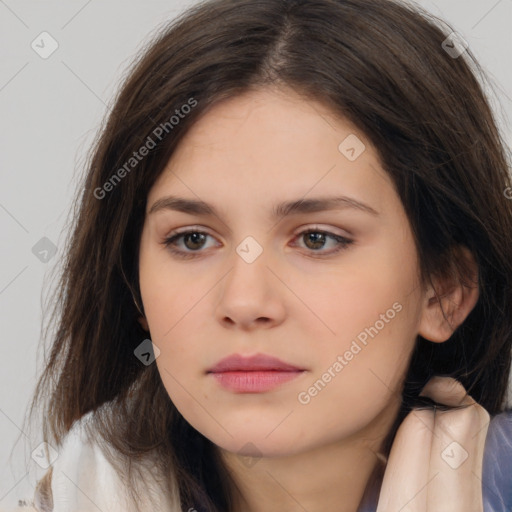 Neutral white young-adult female with long  brown hair and brown eyes