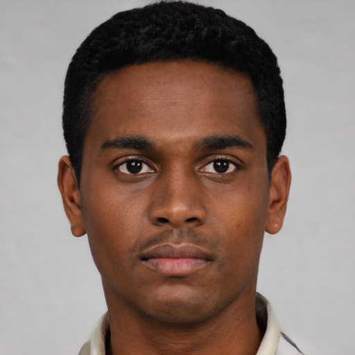 Neutral black young-adult male with short  black hair and brown eyes