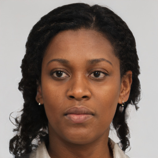 Neutral black young-adult female with long  black hair and brown eyes