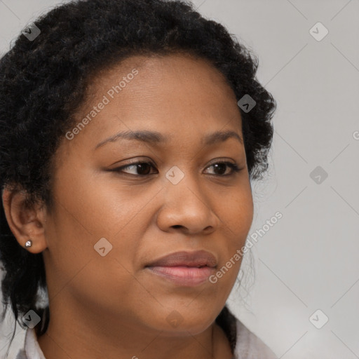 Neutral black young-adult female with long  brown hair and brown eyes