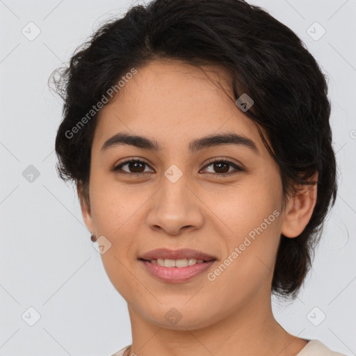 Joyful latino young-adult female with medium  brown hair and brown eyes