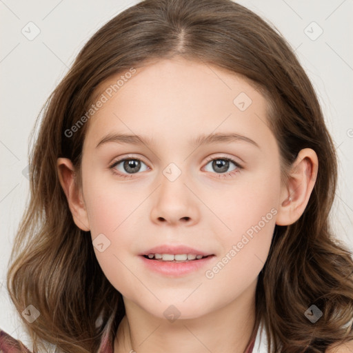 Joyful white child female with long  brown hair and brown eyes