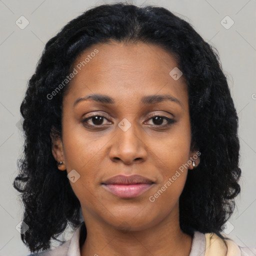 Joyful black young-adult female with medium  black hair and brown eyes