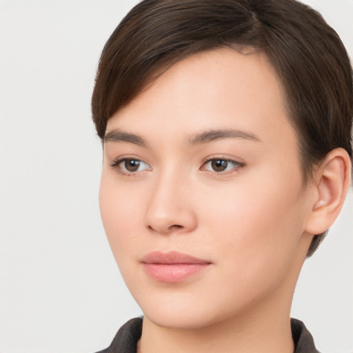 Neutral white young-adult female with long  brown hair and brown eyes