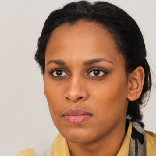 Neutral latino young-adult female with short  black hair and brown eyes