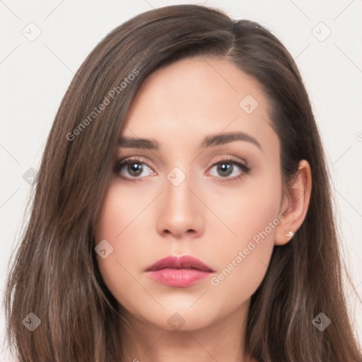 Neutral white young-adult female with long  brown hair and brown eyes