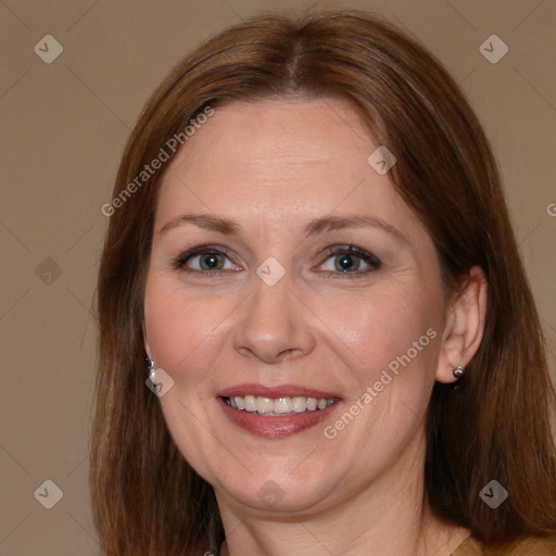 Joyful white adult female with medium  brown hair and brown eyes