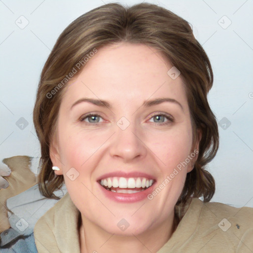 Joyful white adult female with medium  brown hair and blue eyes