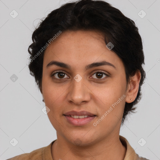 Joyful latino young-adult female with short  brown hair and brown eyes