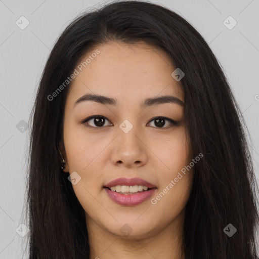 Joyful asian young-adult female with long  brown hair and brown eyes