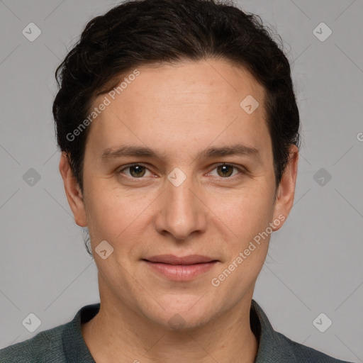 Joyful white adult male with short  brown hair and grey eyes