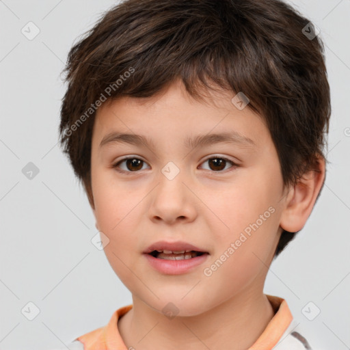 Joyful white child male with short  brown hair and brown eyes