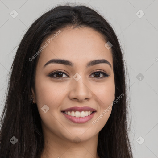 Joyful white young-adult female with long  brown hair and brown eyes