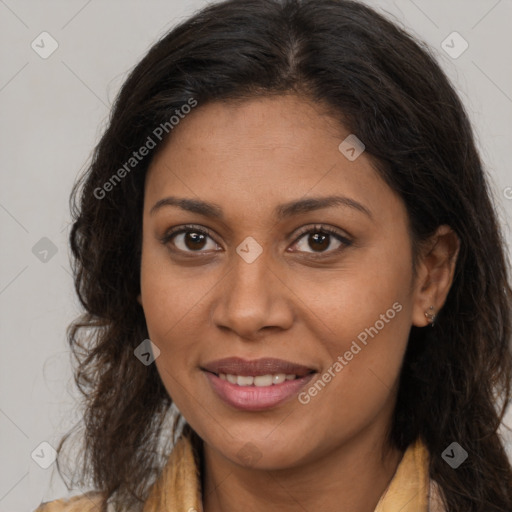 Joyful black young-adult female with long  brown hair and brown eyes