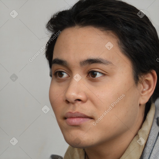 Neutral white young-adult male with short  black hair and brown eyes