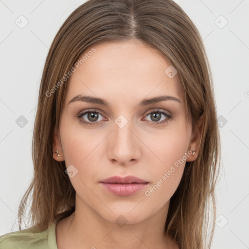 Neutral white young-adult female with long  brown hair and brown eyes