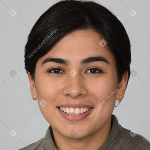 Joyful white young-adult female with short  black hair and brown eyes