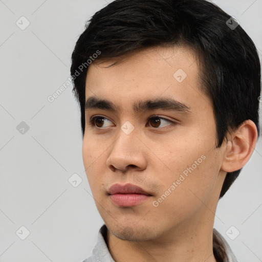 Neutral white young-adult male with short  black hair and brown eyes