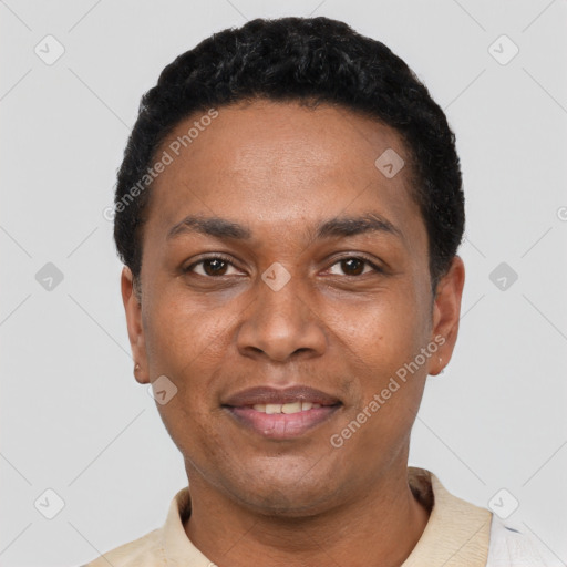 Joyful black young-adult male with short  black hair and brown eyes
