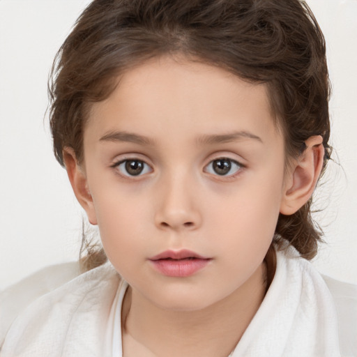 Neutral white child female with medium  brown hair and brown eyes