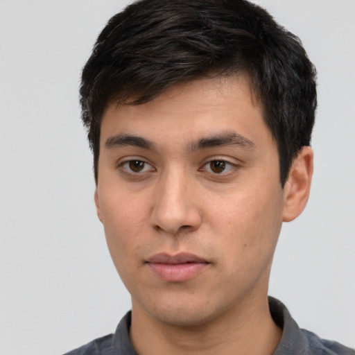 Neutral white young-adult male with short  black hair and brown eyes